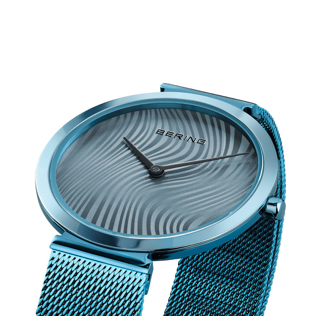 Ice Blue Ladies Watch with Striped Dial and Mesh Strap
