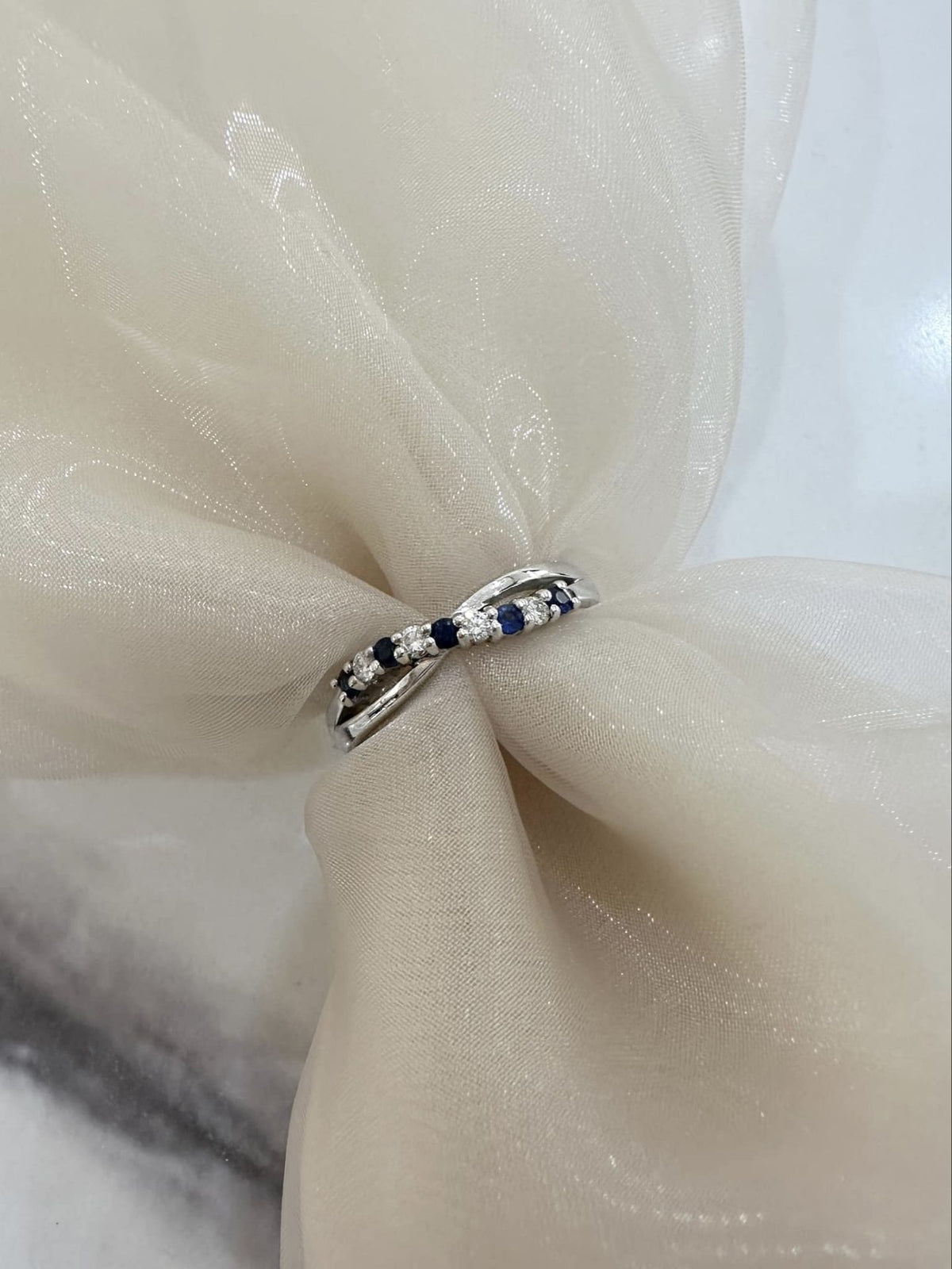 18ct White Gold Sapphire and Diamond Cross Over Eternity Ring 