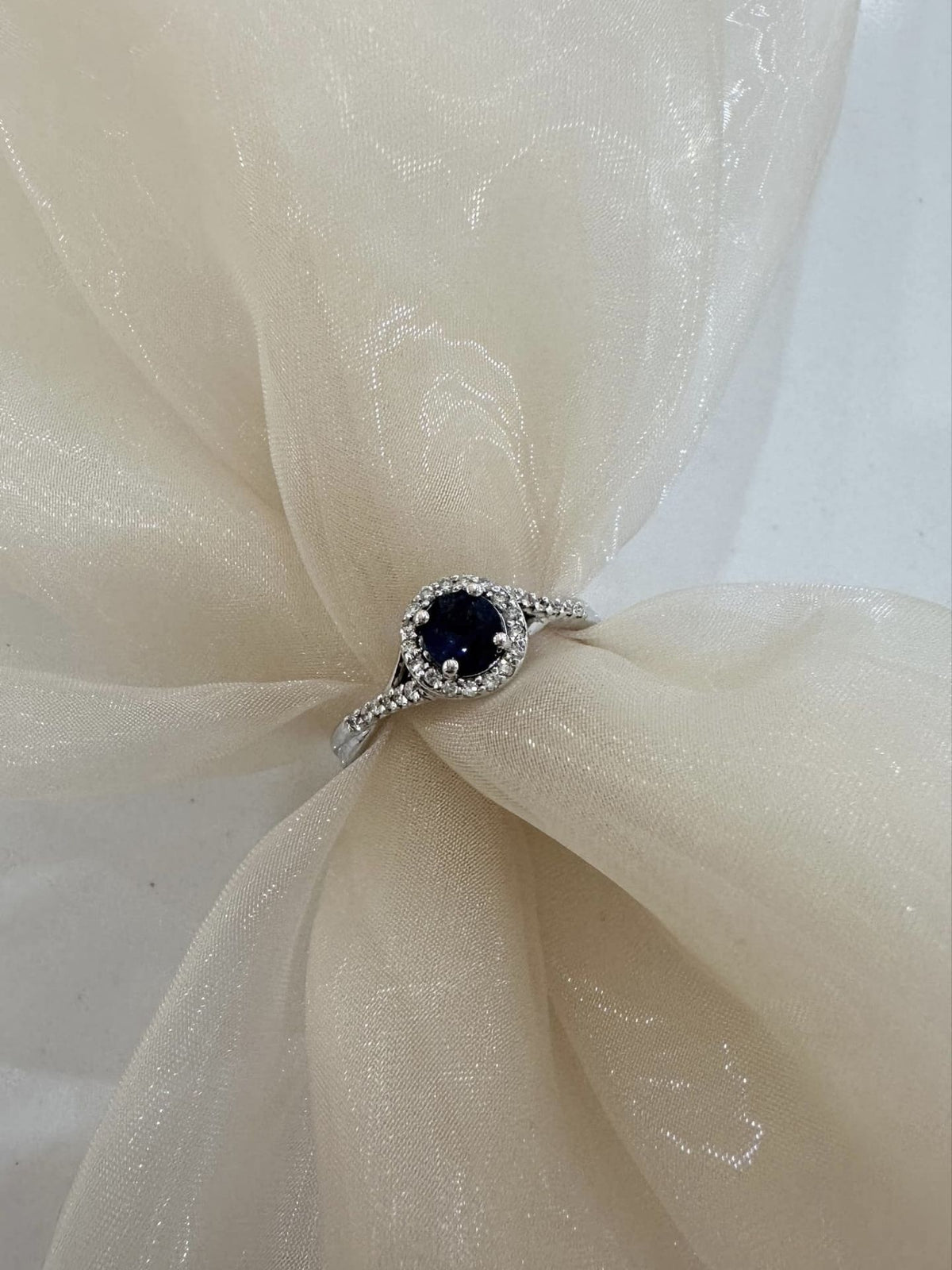 9ct White Gold Diamond and Sapphire Halo ring